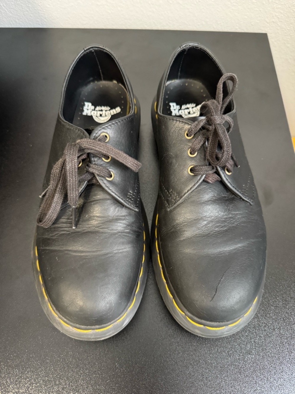 Dr. Martens Black Leather Lace-Up Flats with Yellow Welt